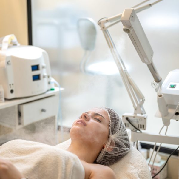 Beautiful,Woman,On,Ozone,Therapy,With,Facial,Steamer,In,Beauty